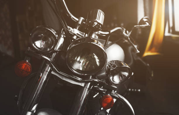 chrome-plated motorcycle parts - front headlight and steering wheel
