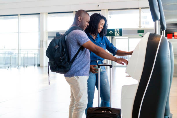 istock Couple at the airport. 1389689617