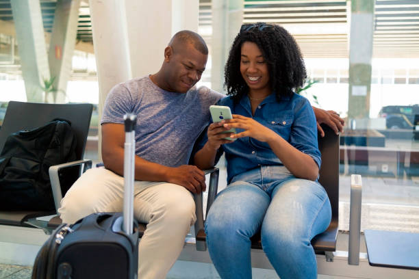 istock Couple at the airport. 1389690725