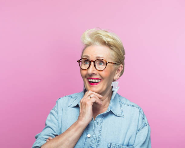 istock Contemplative senior woman looking away 1389691818
