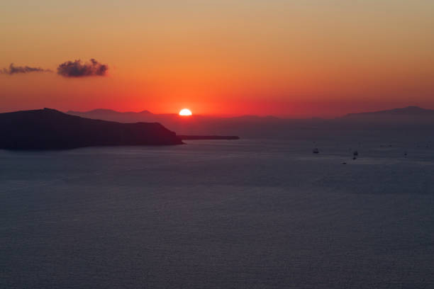 Panagia Thalassitra Church. Taken from the church on the top of the hill in Plaka village (Milos Island, Cyclades, Greece). Below the church of The Assumption of the Virgin Mary or Panaghia Skiniotissa and the church of Panaghia Thalassitra