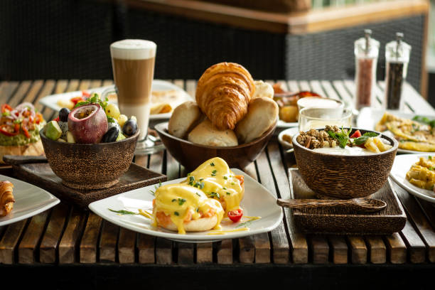 istock Western big gourmet breakfast selection mixed dishes on restaurant table 1389698813
