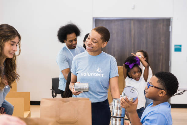 istock Volunteers having a good time 1389698866