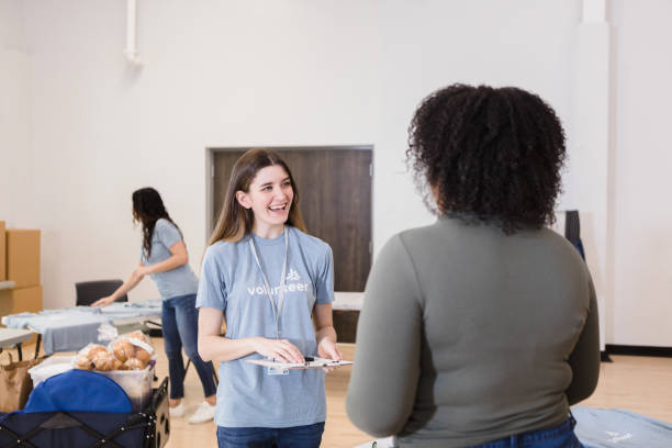 istock Young woman talks to the visitor 1389702525