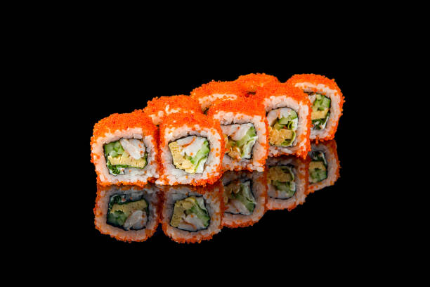 istock California roll with shrimp on black with reflection 1389703926