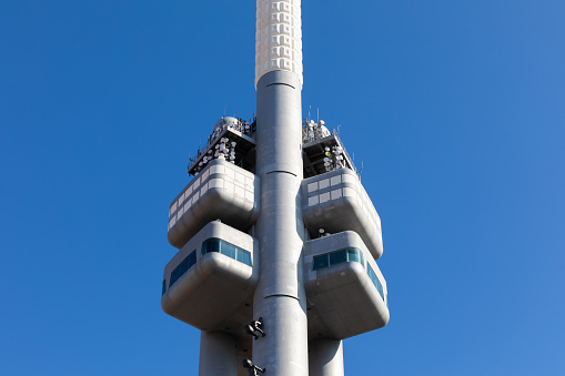 Telecommunication TV broadcast tower, sky background