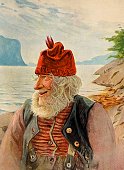 istock Happy Norwegian farmer wearing a red cap, fjord in the background 1389705181