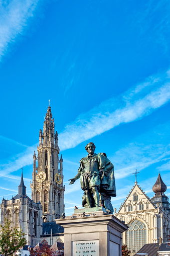 Statue of Rubens in Groenplaats and the belfry of the Cathedral of our Lady, Antwerp, Belgium