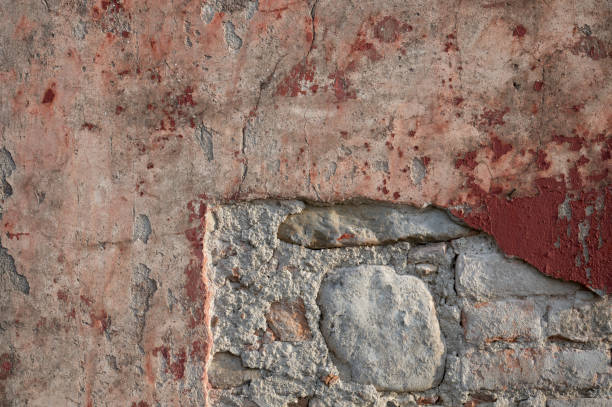 istock Texture of a Stone and Brick Wall with Cracks 1389706733
