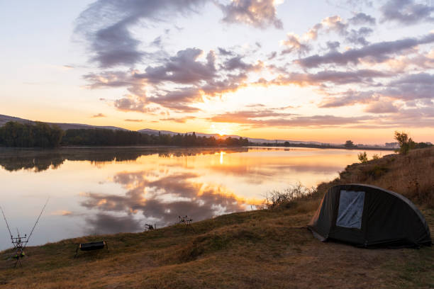 istock Carp fishing rods at sunrise. 1389708327
