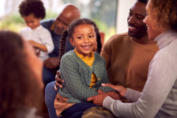 istock Multi-Generation Family Relaxing In Lounge At Home Together 1389709040