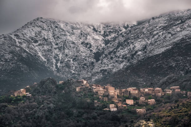 istock Feliceto and snow capped mountains in Corsica 1389709933