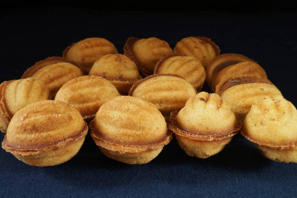 istock Pastry nuts with filling on the table in the kitchen 1389716490