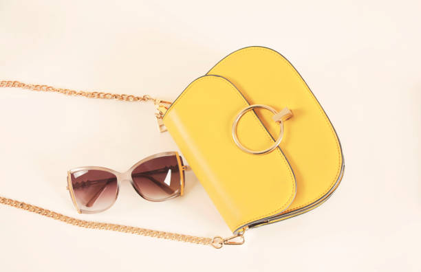 istock woman bag pink sunglasses 1389718105