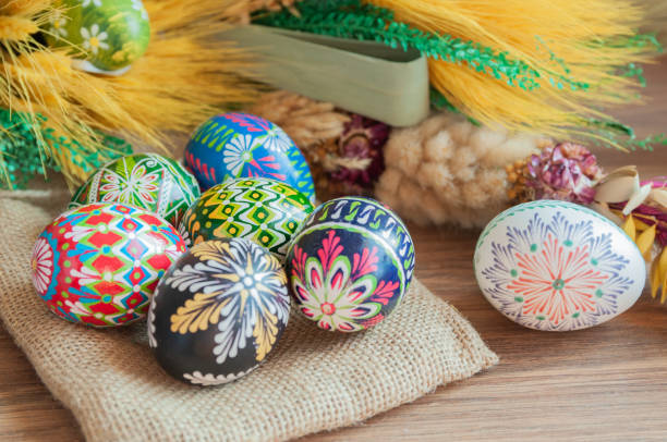 Colorful Easter eggs and Easter palm. stock photo