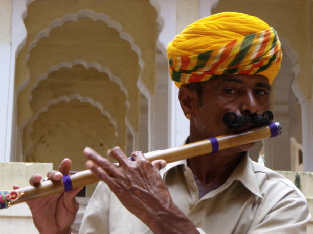 Snake charmer with flute and snakesSee also my LB: