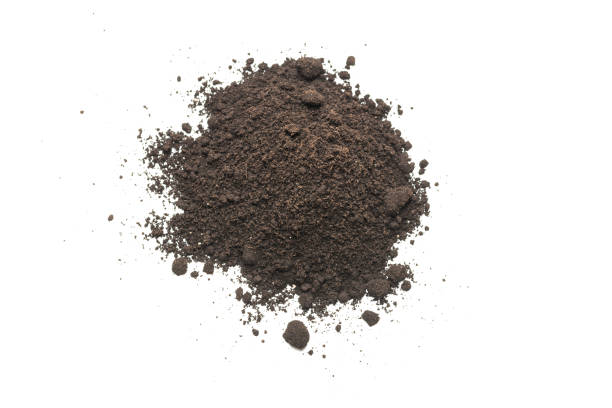 istock Black land for plant isolated on white background. 1389727837