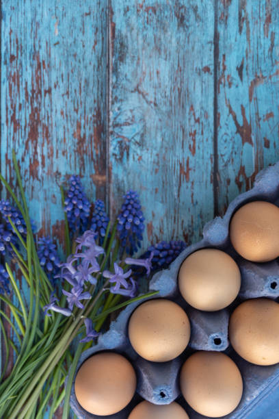 istock Easter egg painting and crafting easter and spring decorations with flowers and eggs 1389729914