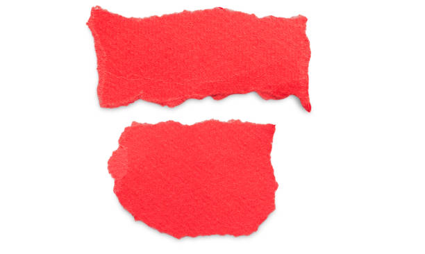 istock on a white background two pieces of red paper 1389729955