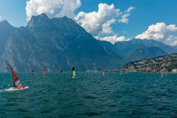 Torbole, Italy - September, 5. 2019: windsurfing on Lake Garda in Italy. Location is near Riva del Garda and Torbole