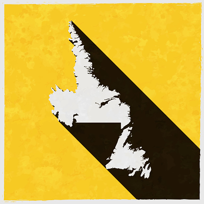 Map of Newfoundland and Labrador in a trendy vintage style. Beautiful retro illustration with old textured yellow paper and a black long shadow (colors used: yellow, white and black). Vector Illustration (EPS10, well layered and grouped). Easy to edit, manipulate, resize or colorize. Vector and Jpeg file of different sizes.