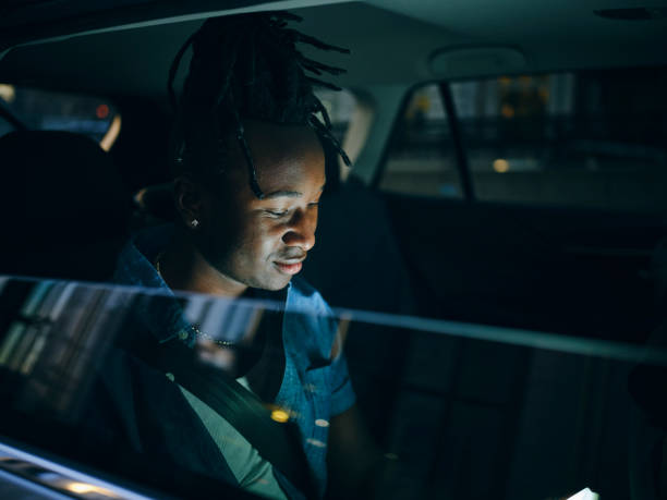 istock Man Driving in the City 1389735771