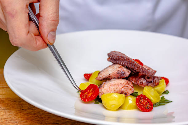 istock Traditional Spanish octopus salad with potatoes, drizzled with olive oil 1389738477