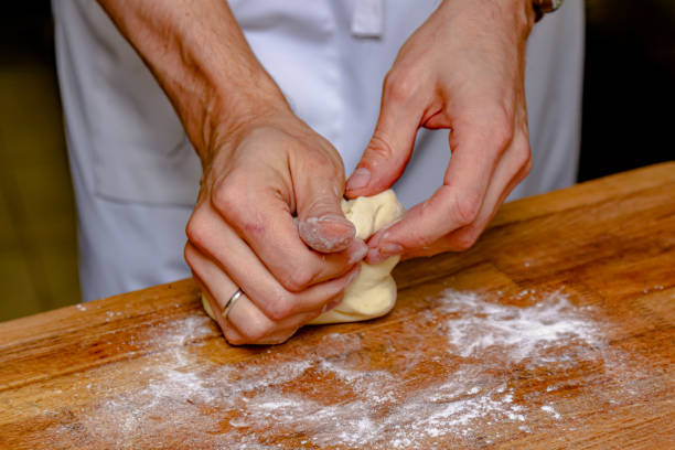 istock The cook prepares dough from flour and eggs 1389738564