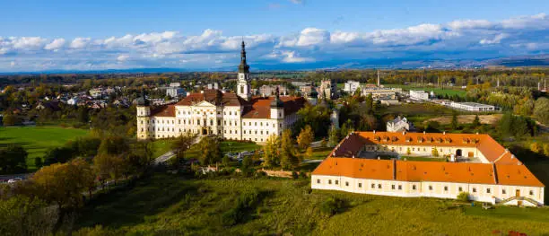 View from drone of Olomouc townscape and Hradisko Monastery at sunny fall day, Moravia, Czech Republic