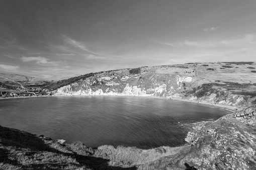 Black and white photo of Lulworth Cove on the Jurassic Coast in Dorset