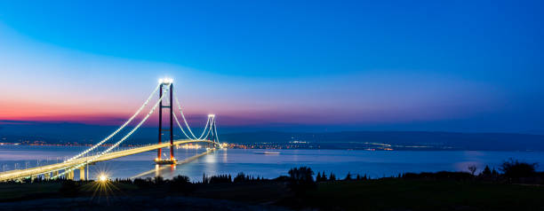 1915 canakkale bridge in canakkale, turkey. world's longest suspension bridge opened in turkey. turkish: 1915 canakkale koprusu. bridge connect the lapseki to the gelibolu. - çanakkale city imagens e fotografias de stock