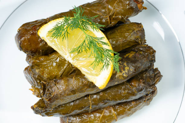 istock Delicious turkish meal dolma. Stuffed grape leaves rice 1389751046