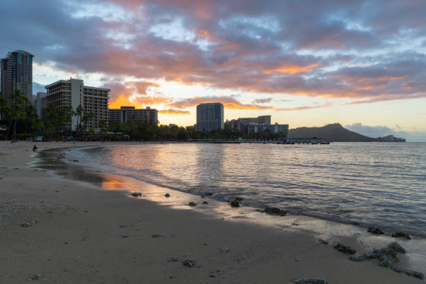 istock Sunrise over Waikiki beach 1389752343