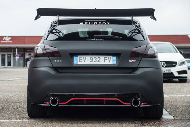 Rear view of black Peugeot 308 GT1 tuning parked in the street stock photo