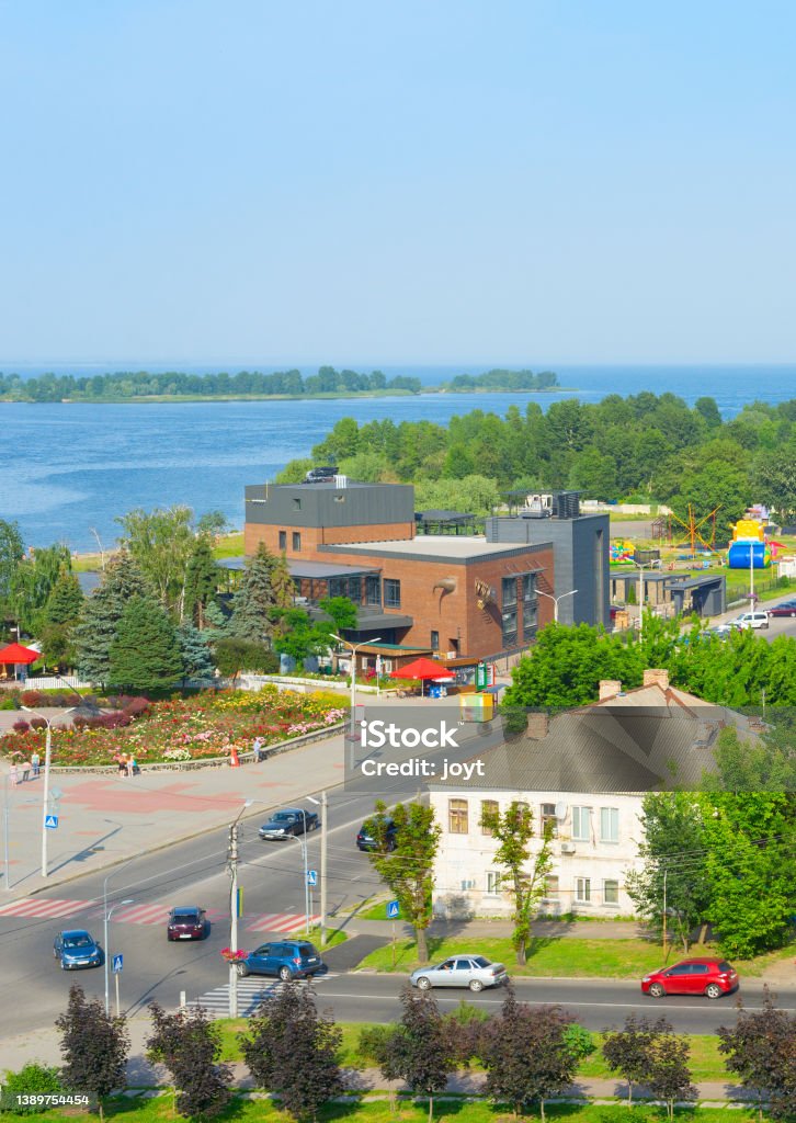 river modern apartment buildings Cherkasy Aerial view Dnipro river, cars on a road and modern apartment buildings. Cherkasy, Ukraine Architecture Stock Photo