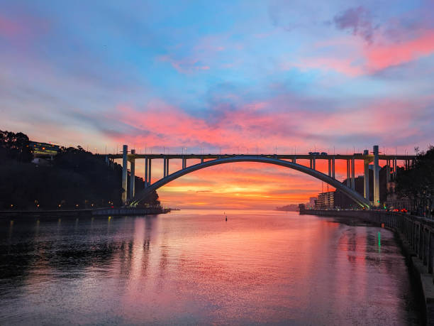 istock Colorful sunset Arrabida bridge Porto 1389754465