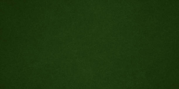 istock Elegant dark emerald green background with black shadow border and old vintage grunge texture design 1389755538