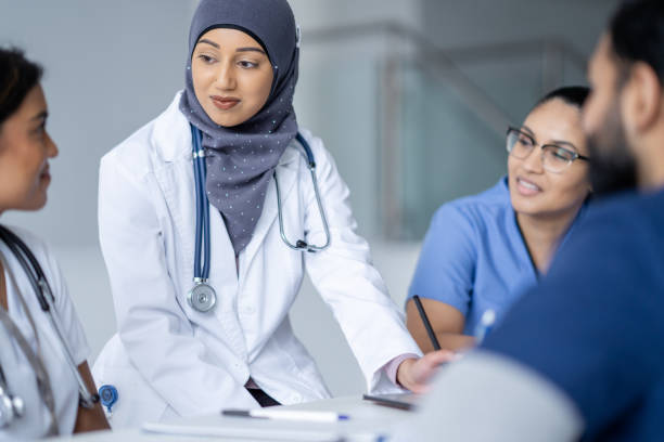 istock Nursing Staff Team Meeting 1389755756