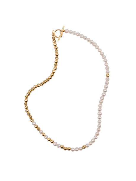 istock Pearl golden necklace isolated on white 1389757116