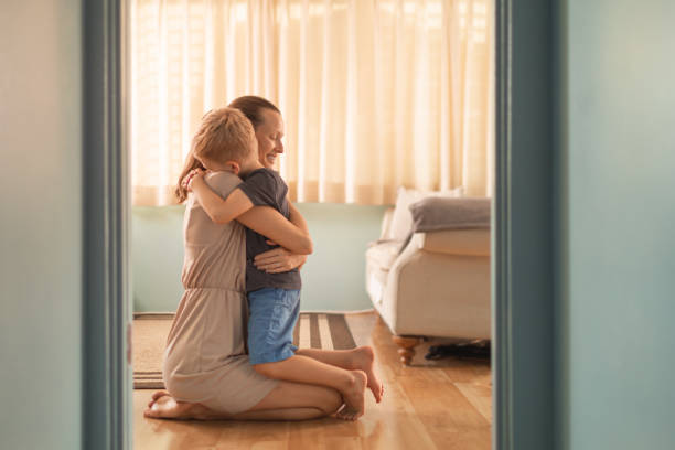 Mother and son hugging. I love you son.