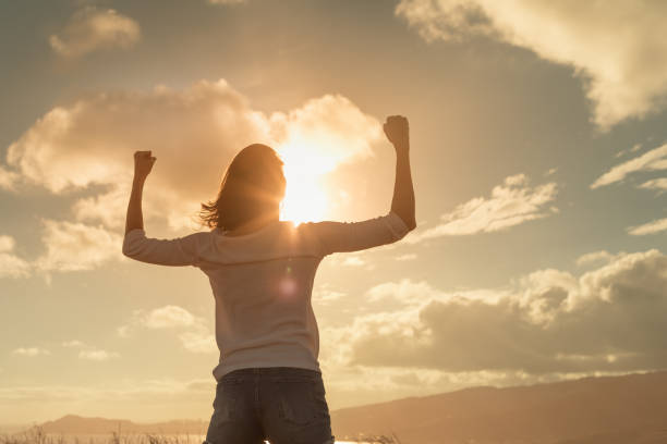 istock Strong woman flexing her muscles. Emancipation. 1389762847