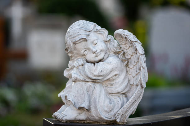 istock Angel statue in cemetery,Bistrita, Romania 1389770578