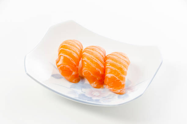 Salmon sushi nigiri on white background.
