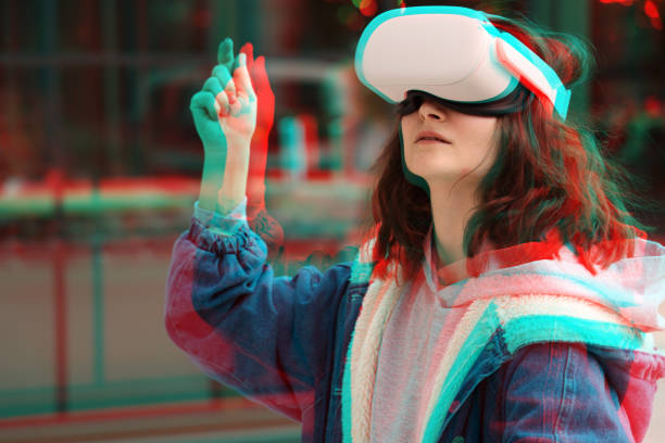 woman wearing vr glasses - ai finger gamer imagens e fotografias de stock