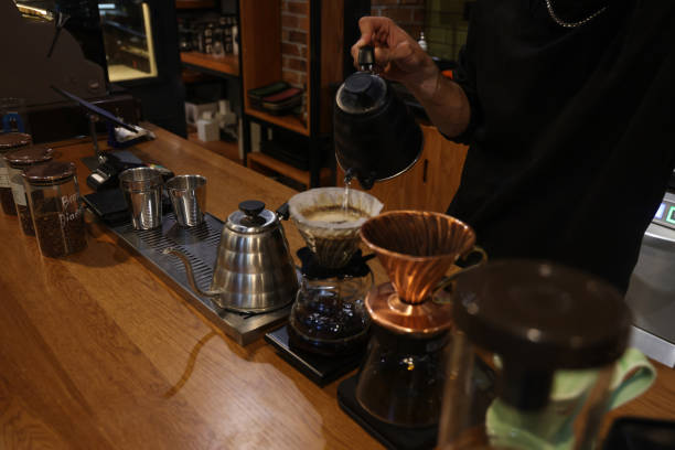 istock Barista at work in a cafe. Preparing pour over coffee 1389772799