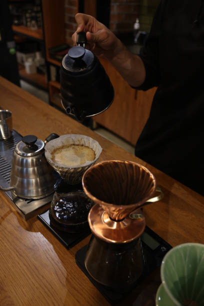istock Barista at work in a cafe. Preparing pour over coffee 1389772824
