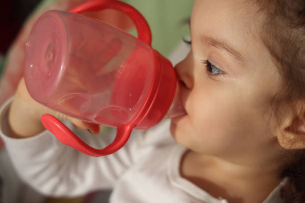 Baby Girl With Bottle