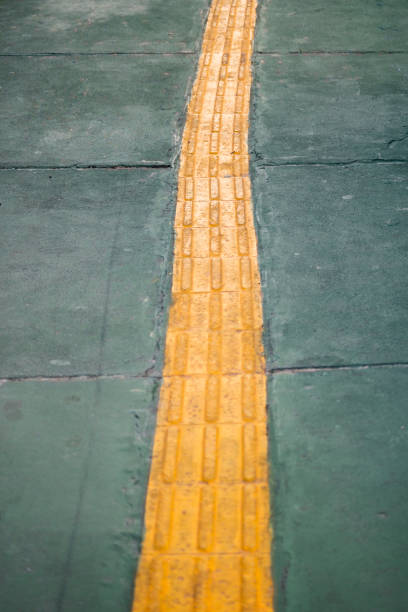 istock Lane for the visually impaired on the sidewalk. 1389774120