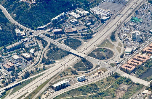 An aerial view of a San Diego freeway cloverleaf