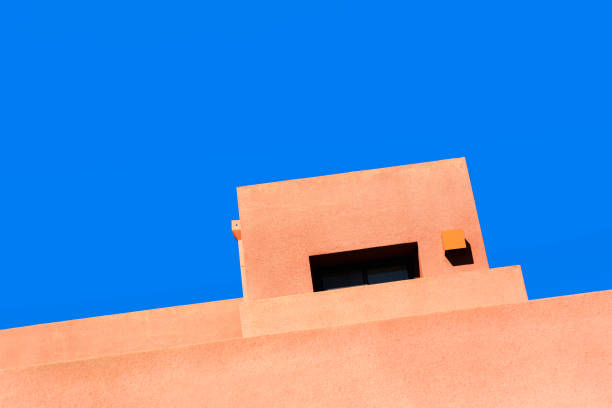 istock Santa Fe Style: Modern Adobe Building Exterior Detail, Blue Background 1389781983
